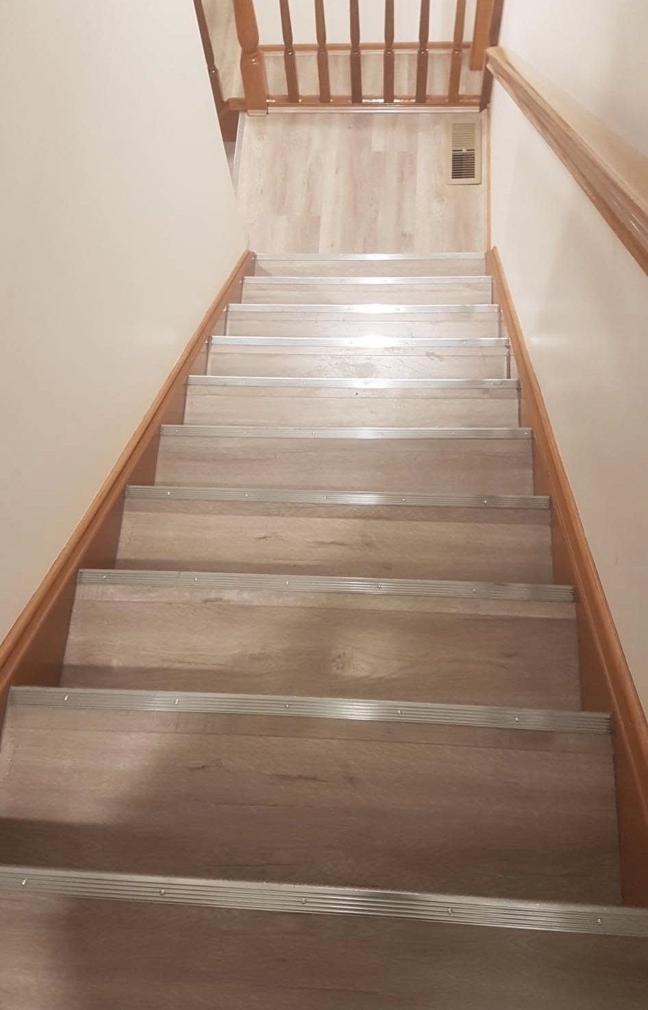Real Ghane Flooring project: completed staircase and upstairs landing flooring